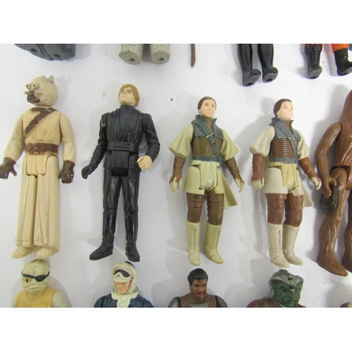 9052 - A group of twenty loose vintage Kenner / Palitoy Star Wars action figures to include Han Solo in Hot... 