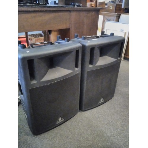 1102 - A pair of Behringer B300 speakers with tripod stands