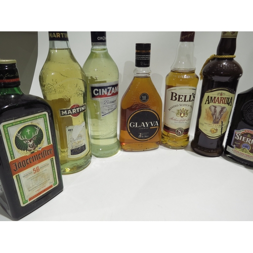 8301 - Ten bottles of various spirits, Antica Sambuca Classic 70cl, Glayva Liqueur 70cl, Sierra Coffee Tequ... 