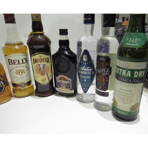 8301 - Ten bottles of various spirits, Antica Sambuca Classic 70cl, Glayva Liqueur 70cl, Sierra Coffee Tequ... 