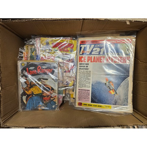 9040 - A box of mixed mid-late 20th Century comics including Eagle, G.I. Combat, Tarzan, Western/Cowboy rel... 