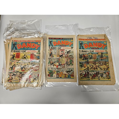 9034 - A group of vintage 1940s/50s comics to include 'Dandy', 'Beano', and 'The Champion and Triumph' incl... 