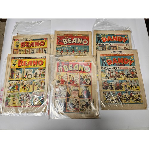 9034 - A group of vintage 1940s/50s comics to include 'Dandy', 'Beano', and 'The Champion and Triumph' incl... 