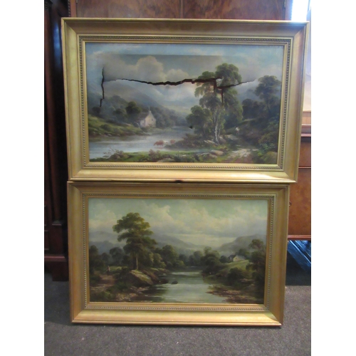 4024 - T. TREVOR (XIX): A pair of oils on canvas, river landscapes with cattle watering, a farmstead and mo... 