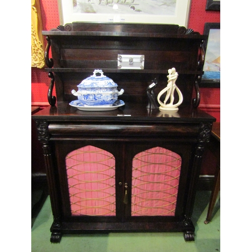 4041 - A William IV rosewood chiffonier the raised back of two shelves with 'S' scroll supports and carved ... 