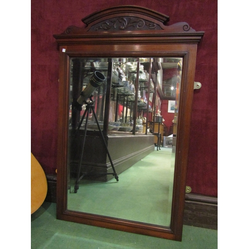 4218 - A framed bevelled edge wall mirror, 89cm x 55cm