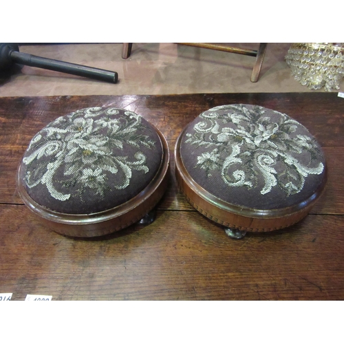 4274 - A pair of Victorian inlaid walnut circular stools with beadwork decoration on turned feet