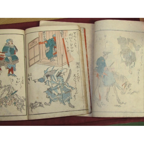 5270 - (Japan.) A 19th Century Japanese woodblock printing illustrated book, card loosely inserted with old... 