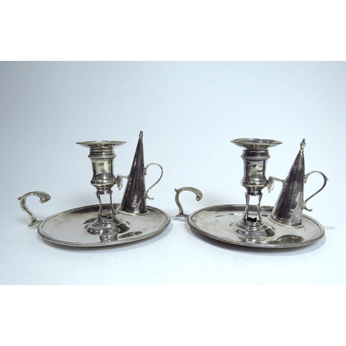 7082 - A pair of George III Edmund Vincent silver chamber sticks with later snuffers, crested eagle on rabb... 