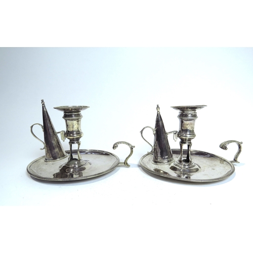 7082 - A pair of George III Edmund Vincent silver chamber sticks with later snuffers, crested eagle on rabb... 