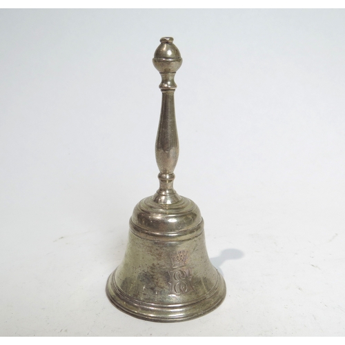 7075 - A Georgian silver bell with crown crest, marks undecipherable, 11cm tall.  120g