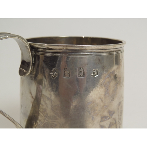 7073 - A George I John East silver tankard of small proportions, the base with punched R.C. initials, Londo... 