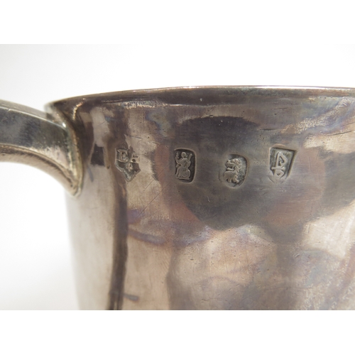 7077 - A William & Mary John East Britannia Standard twin handled cup with eagle and nest crest, London 169... 