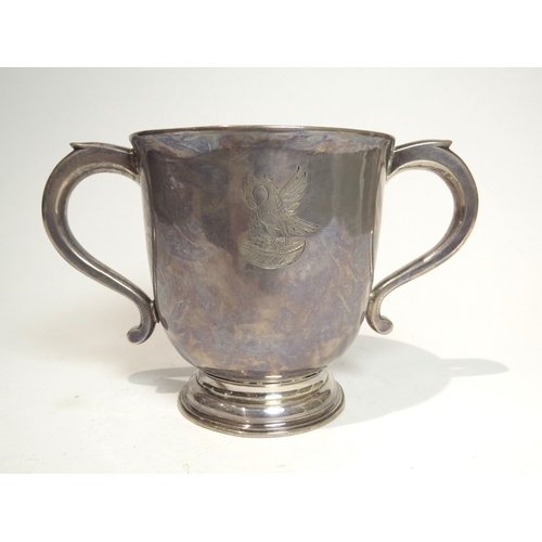 7077 - A William & Mary John East Britannia Standard twin handled cup with eagle and nest crest, London 169... 