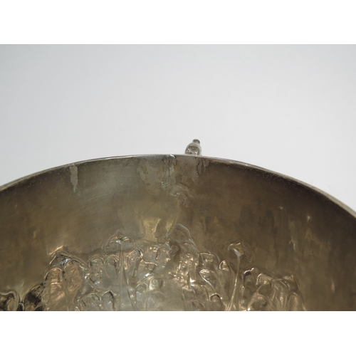 7066 - A Charles II silver porringer with Armorial crest and MB initialled monogram.  The base with maker's... 