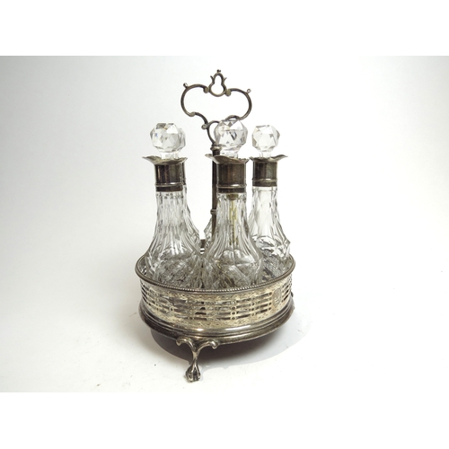 7080 - A Victorian John Wilmin Figg silver cruet stand with five crystal bottles to interior, slight nibble... 