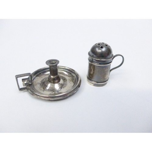 7125 - Two silver vinaigrettes (one with hinge a/f) a miniature silver chamber stick, and a silver miniatur... 