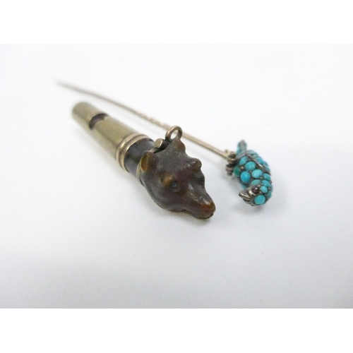 7033 - A small whistle with a dogs head finial and a stickpin with turquoise-set finial as a bird (2)