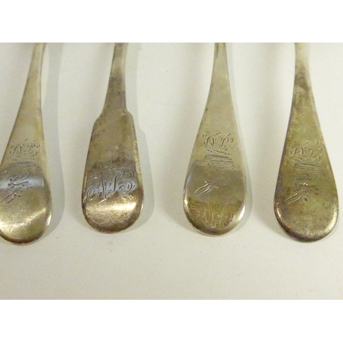 7164 - Four Georgian silver small dessert spoons, various makers and dates, monogram to handle, including 1... 