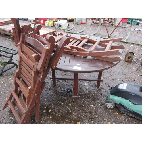 3440 - A hardwood garden table with four chairs