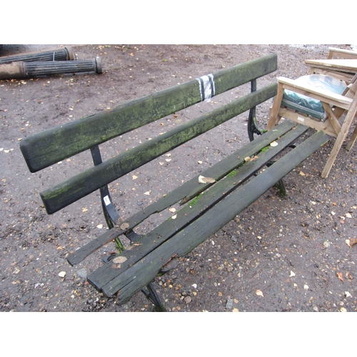 3441 - A cast ended timber slatted garden bench