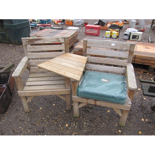 3442 - A pair of wooden garden chairs with a drink table insert