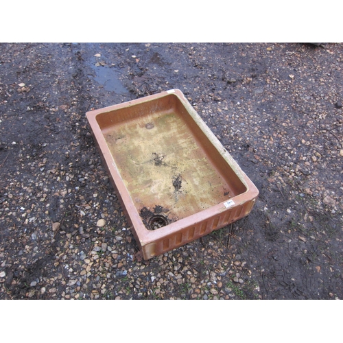 3448 - A brown glazed shallow sink