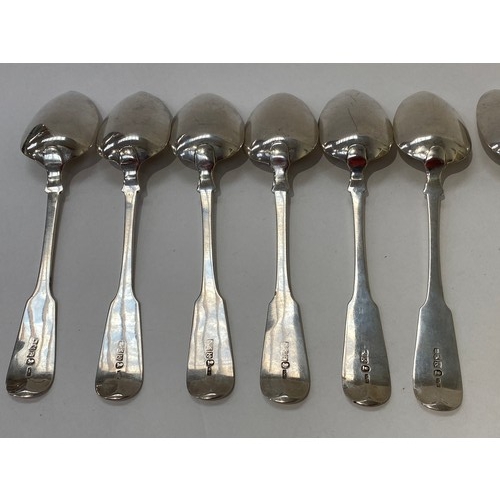 7089 - A set of twelve William Hannay Scottish silver serving spoons numbered 1-12 Glasgow 1829, 823g