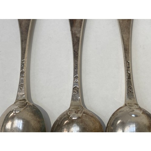 7092 - A set of six George II silver spoons, with stags crest, London 1733, 226g