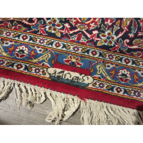 7630 - A mid 20th Century Persian Keshan/Kashan rug signed in Persian 