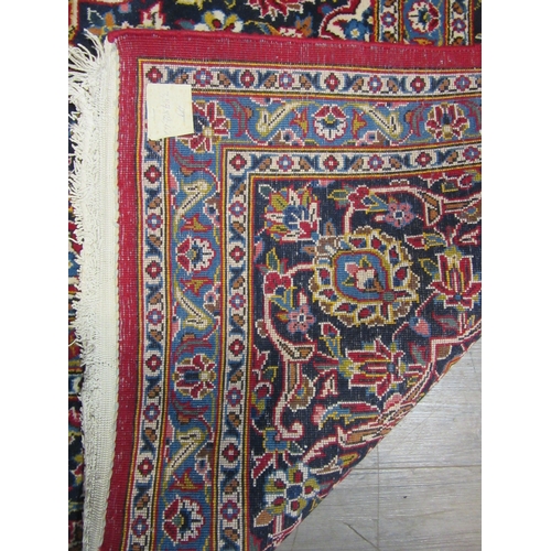 7630 - A mid 20th Century Persian Keshan/Kashan rug signed in Persian 