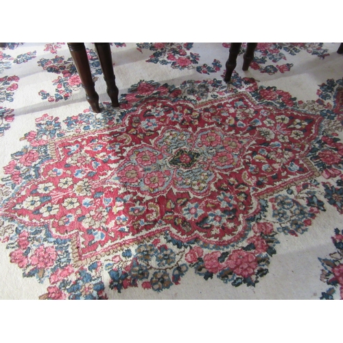 7633 - A large 20th Century cream carpet with central floral medallion and further floral sprays, 322cm x 5... 