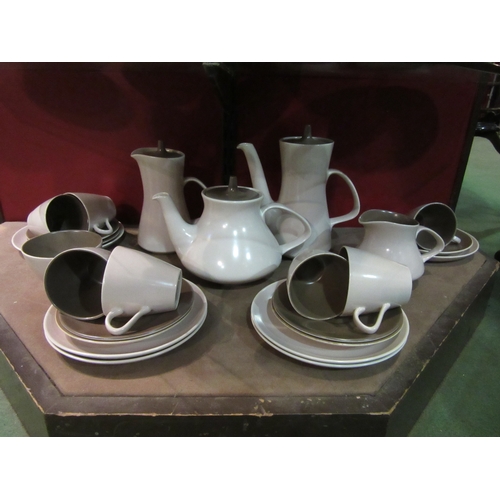 4006 - A quantity of Poole Pottery tea and coffee ware, two-tone mushroom and sepia colour way