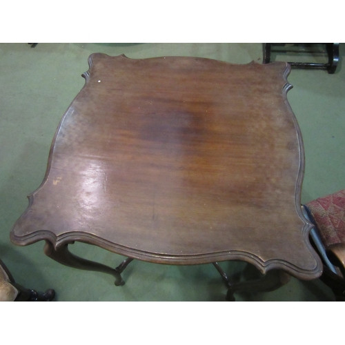 4012 - A mahogany two tier lamp table, 72cm high x 52cm x 52cm