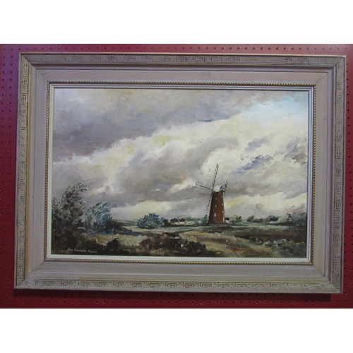 4069 - JOHN CONSTABLE REEVE: Oil on board of a windmill. Signed lower left. Framed. 39cm x 59cm image size