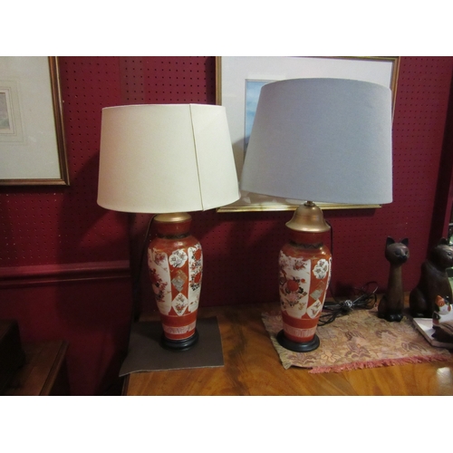 4072 - A pair of Japanese Katani 19th Century table lamps - marks to base, with cream shades, 58cm tall wit... 