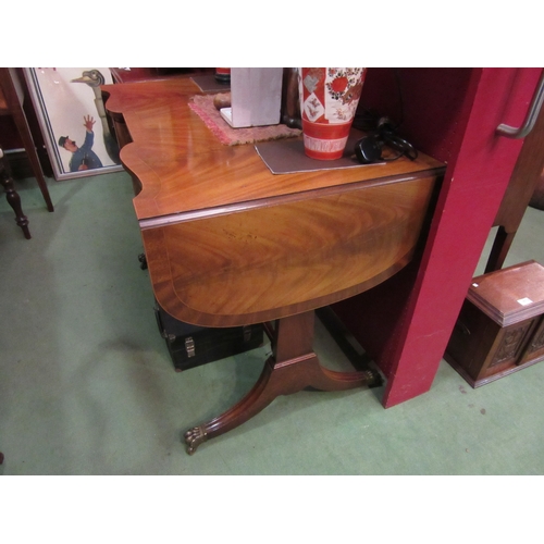 4073 - A George III revival crossbanded flame mahogany and burr walnut sofa table. The rising leaves over a... 