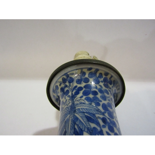 1296 - A Chinese blue and white porcelain vase of baluster form, allover foliage, converted into a lamp bas... 