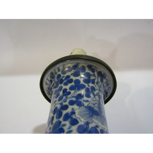 1296 - A Chinese blue and white porcelain vase of baluster form, allover foliage, converted into a lamp bas... 