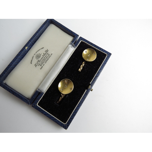 7043 - A pair of diamond-set high carat gold cufflinks, unmarked, 8.8g