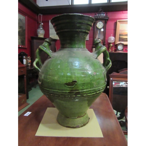 4225 - A large terracotta green glazed vase with ornamental lizard form handles, 46cm tall, a/f