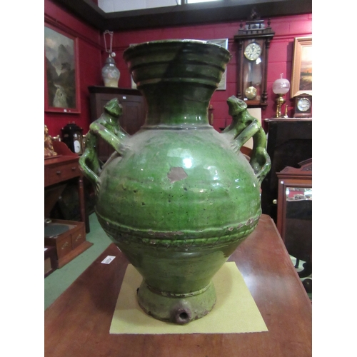 4225 - A large terracotta green glazed vase with ornamental lizard form handles, 46cm tall, a/f