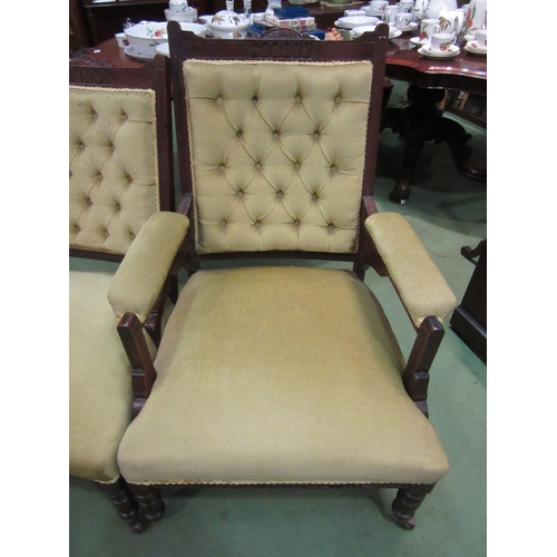 4231 - Circa 1890 a pair of walnut armchairs the turned fore legs to ceramic castors