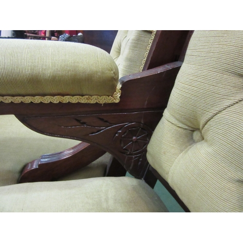 4231 - Circa 1890 a pair of walnut armchairs the turned fore legs to ceramic castors