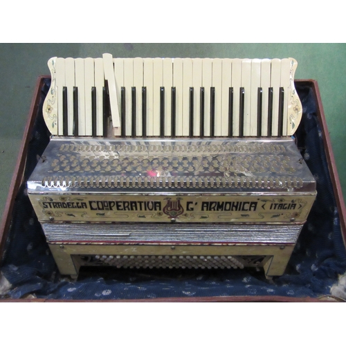 4247 - An Italian accordion, cased, a/f