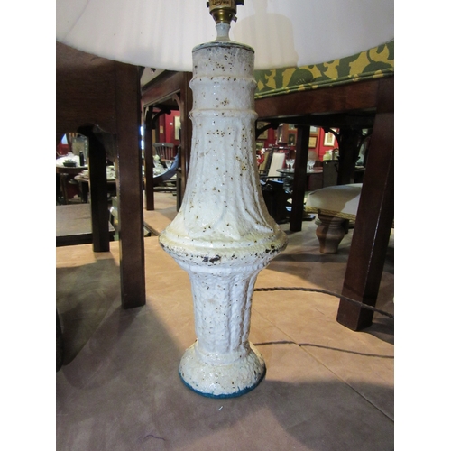 4265 - A cast iron table lamp with pleated shade