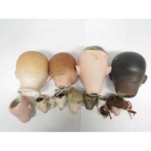 9279 - Twelve early 20th Century and later bisque doll heads including Heubach Koppelsdorf, Strobel & Wilki... 