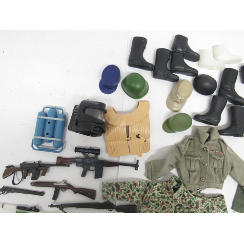 9212 - A collection of vintage Action Man and similar weapons, accessories and clothing