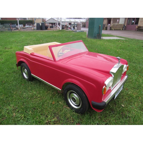 9140 - A 1980s Sharna for Triang Rolls Royce Corniche pedal car with electric motor, red moulded plastic bo... 