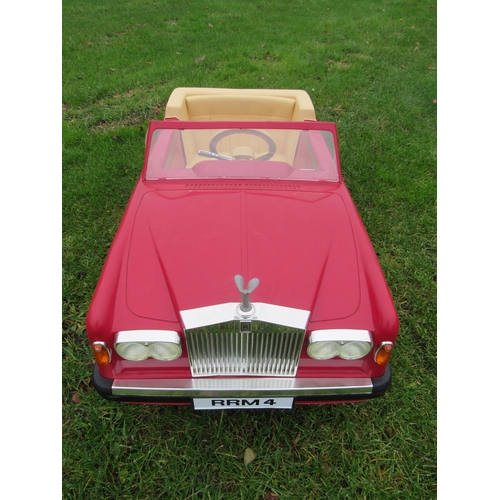 9140 - A 1980s Sharna for Triang Rolls Royce Corniche pedal car with electric motor, red moulded plastic bo... 